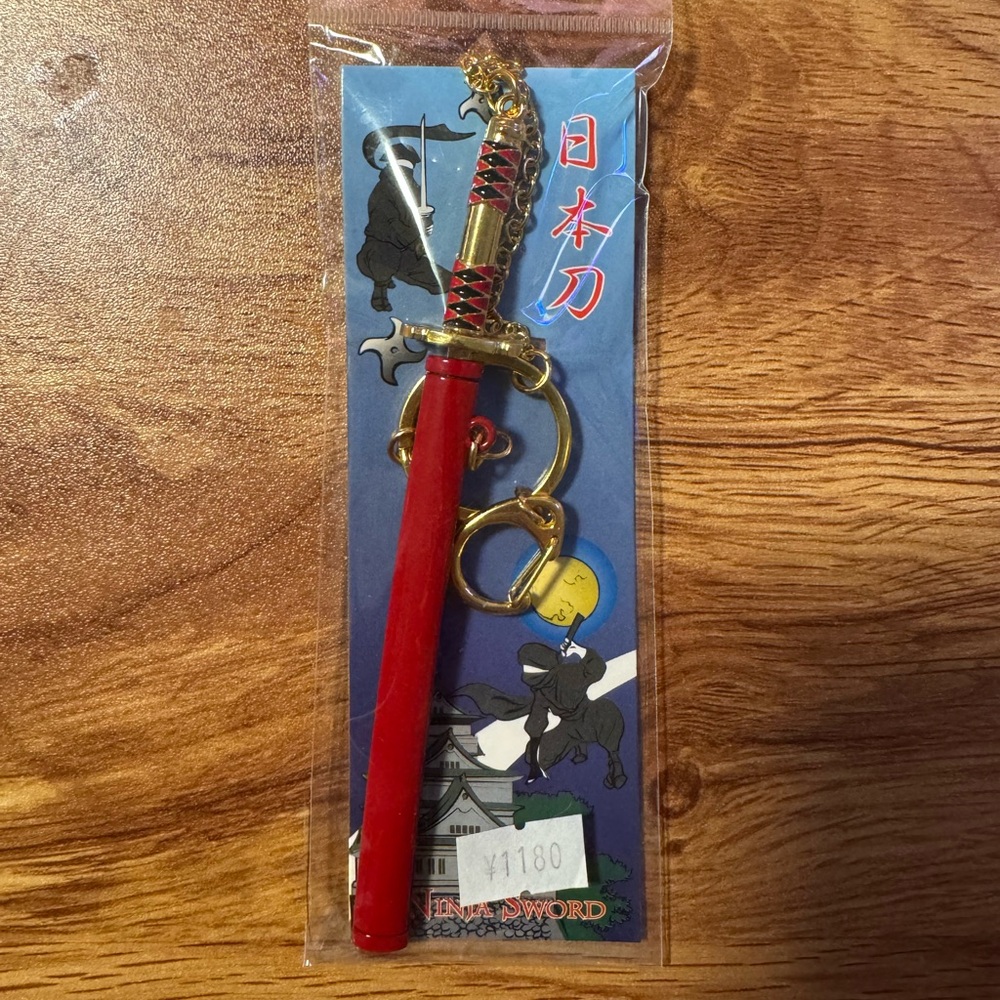 Red Sword Keychain with Gold Accents
